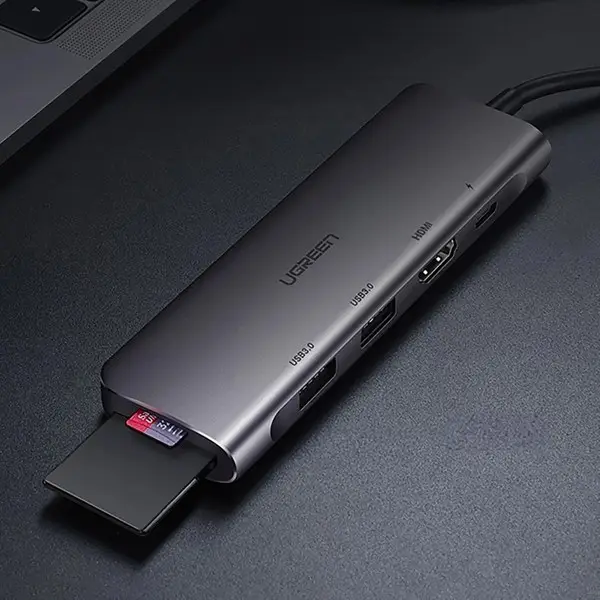 Ugreen CM195 6-in-1 USB-C adapteris – HDMI / 2× USB-A 3.0 / USB-C PD / SD / TF kortelių skaitytuvas – pilkas – 6